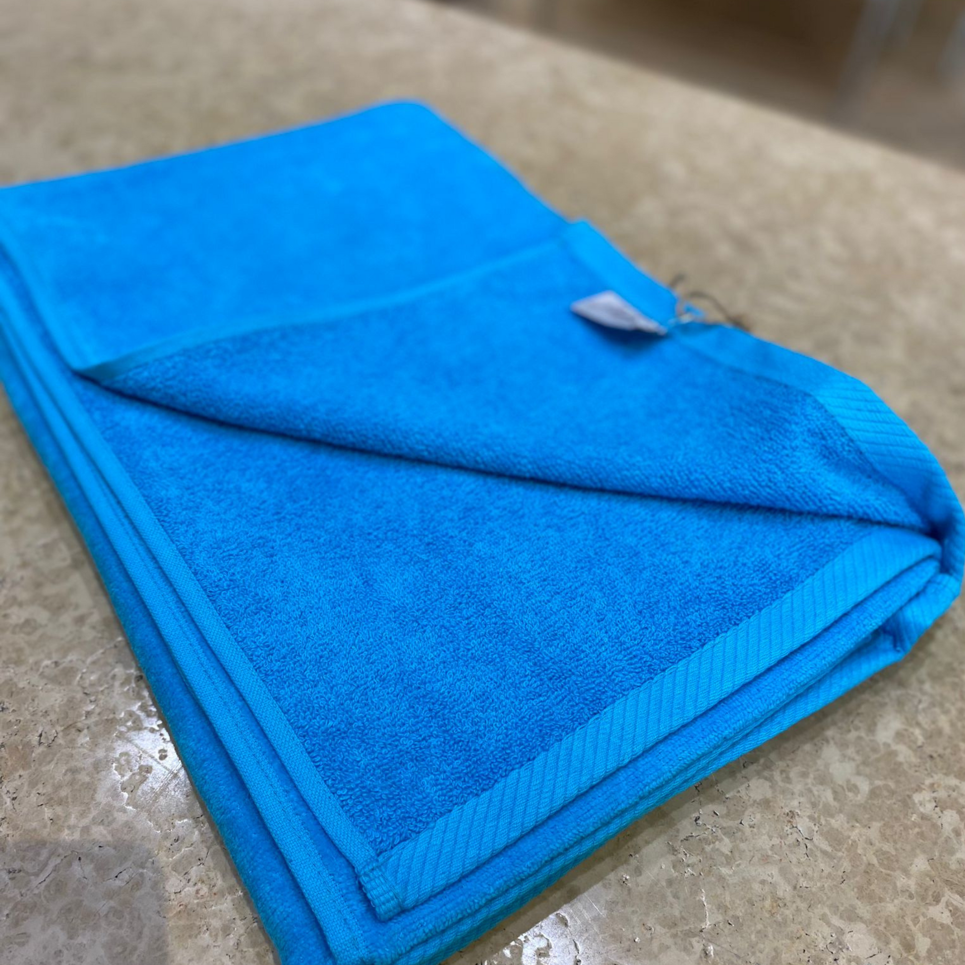 Asciugamano in cotone velour motivo in rilievo - | Ecom Asciugamano in cotone velour motivo in rilievo - | Ecom